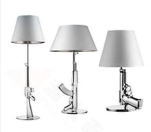 Load image into Gallery viewer, Gun Table Lamps (Available in Gold or Silver)