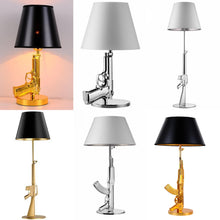 Load image into Gallery viewer, Gun Table Lamps (Available in Gold or Silver)