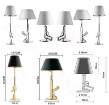 Load image into Gallery viewer, Gun Table Lamps (Available in Gold or Silver)