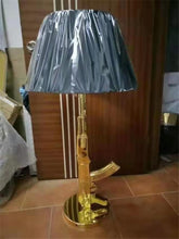 Load image into Gallery viewer, Gun Table Lamps (Available in Gold or Silver)
