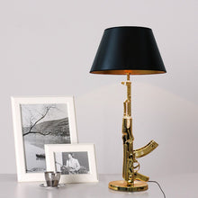 Load image into Gallery viewer, Gun Table Lamps (Available in Gold or Silver)